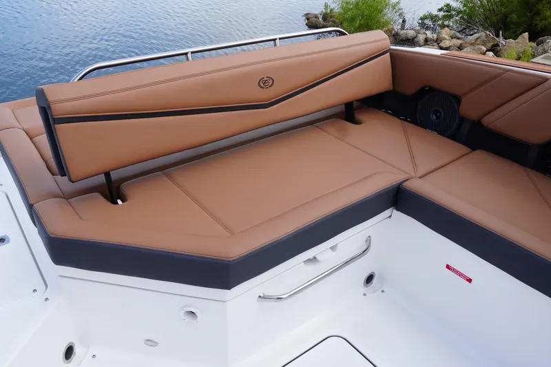 Slide: The Image of Luxurious seating on 2025 Cobalt R8 Surf boat, featuring tan upholstery and sleek design. - 9