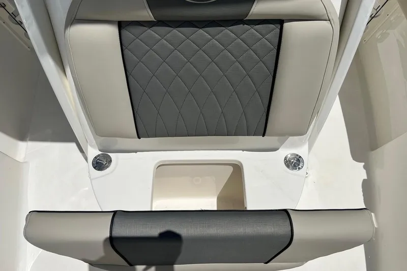 Slide: The Image of 2026 Key West 219 FS boat seat with quilted gray upholstery. - 15