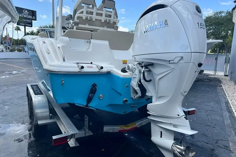 Slide: The Image of 2026 Key West 219 FS boat with Yamaha 150 engine on a trailer. - 5