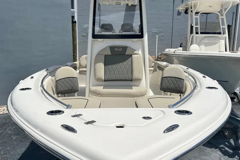 Slide: The Image of 2026 Key West 219 FS boat with sleek design and comfortable seating. - 7