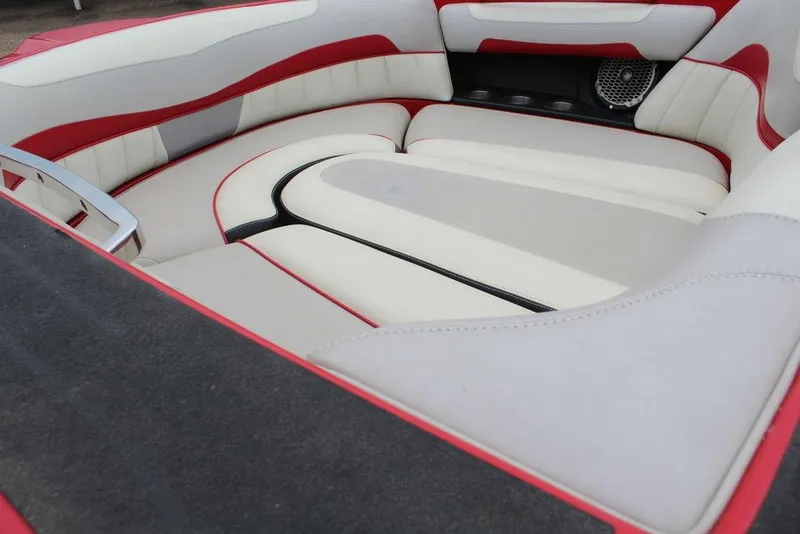 Slide: The Image of 2012 Malibu Wakesetter 22 MXZ interior with red and white seating. - 9