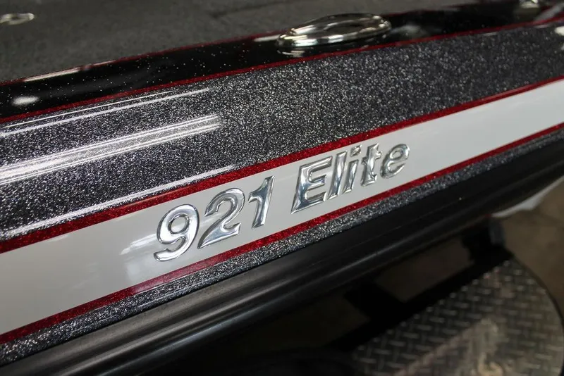 Slide: The Image of 2024 Phoenix 921 Elite boat with metallic finish and chrome lettering. - 9