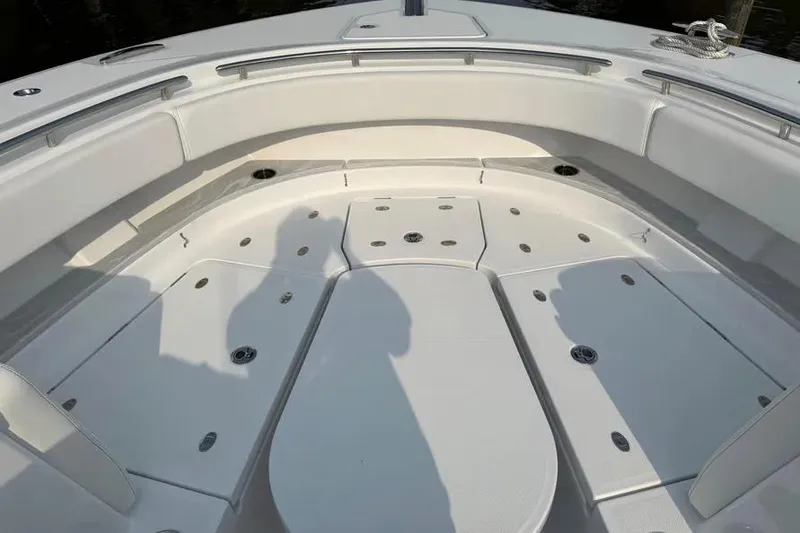 Slide: The Image of 2025 HCB 48 Campeon boat interior with spacious seating and storage compartments. - 3