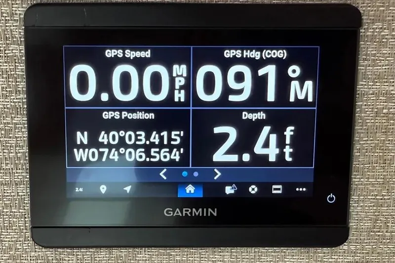 Slide: The Image of Garmin GPS display on 2025 HCB 48 Campeon, showing speed, heading, position, and depth. - 53