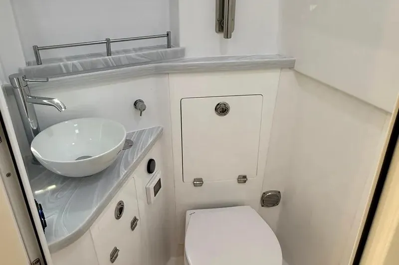 Slide: The Image of Luxurious bathroom in 2025 HCB 48 Campeon boat with modern fixtures and sleek design. - 60