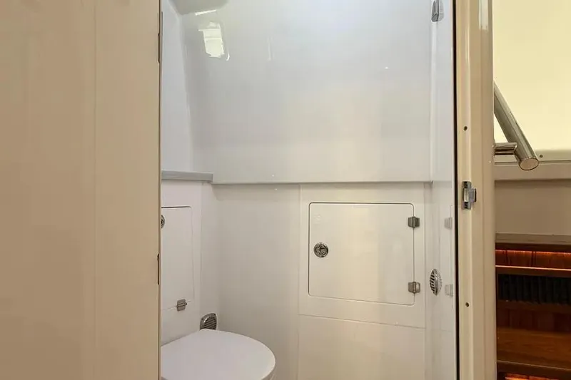 Slide: The Image of 2025 HCB 48 Campeon yacht bathroom interior with modern fixtures and white cabinetry. - 67