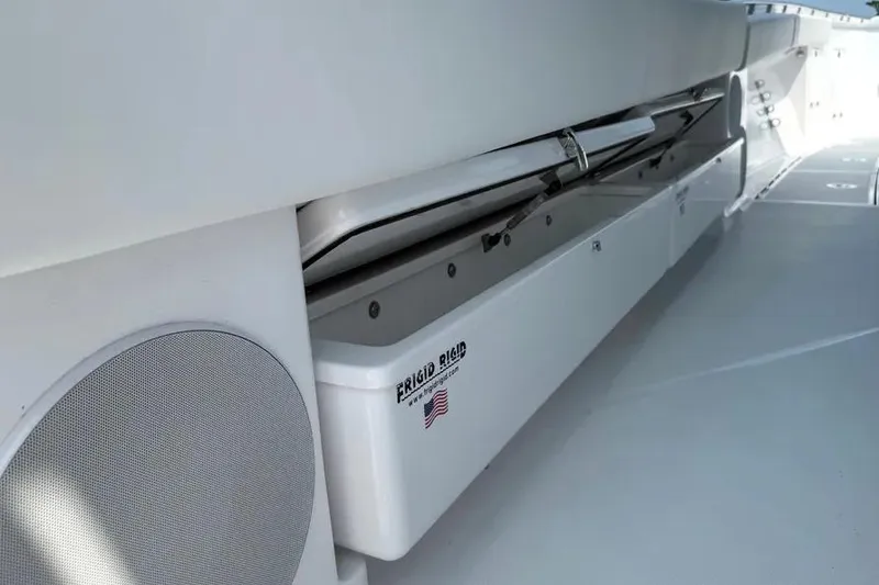 Slide: The Image of 2025 HCB 48 Campeon boat interior with Frigid Rigid cooler and speaker. - 71