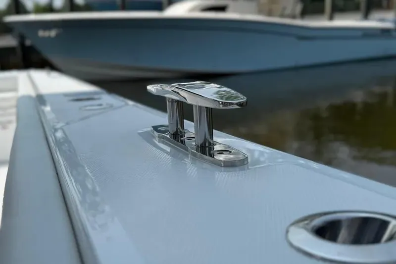 Slide: The Image of 2025 HCB 48 Campeon boat cleat detail with blurred background. - 75