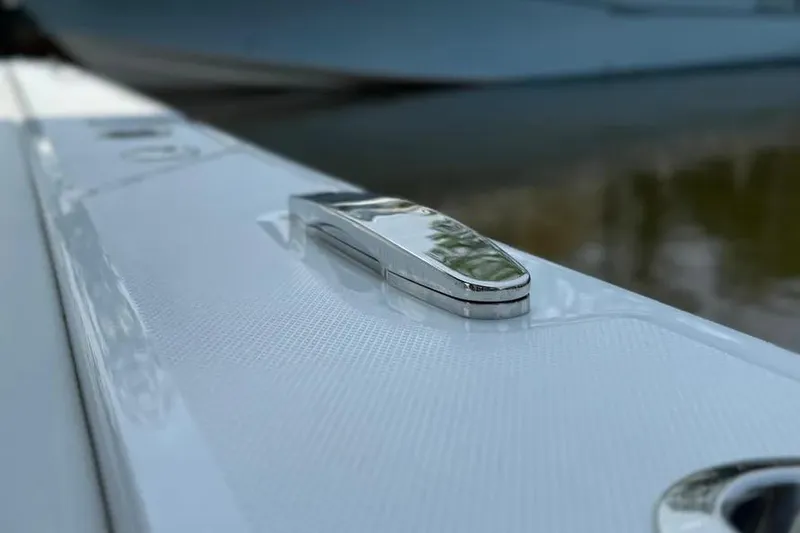 Slide: The Image of Close-up of 2025 HCB 48 Campeon boat's sleek chrome cleat on white deck. - 76
