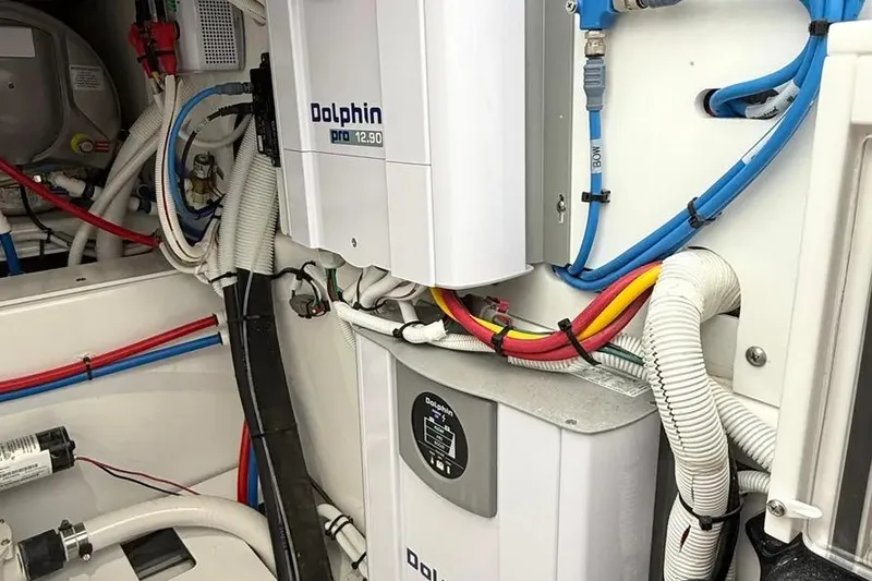 Slide: The Image of Electrical system inside 2025 HCB 48 Campeon boat, featuring Dolphin Pro 12.90 components. - 78