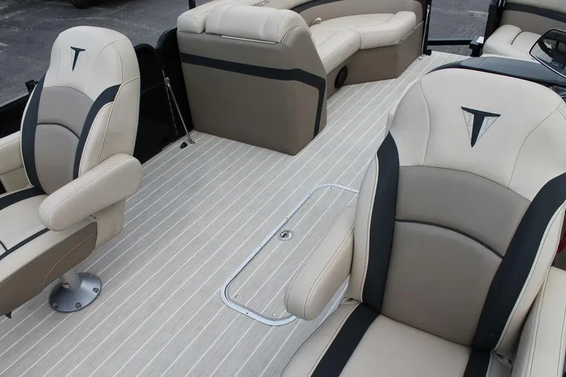 Slide: The Image of 2023 Trifecta 24UL-CS boat interior with luxurious seating and sleek design. - 13