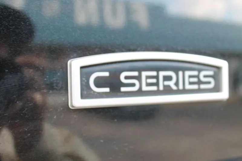 Slide: The Image of 2023 Trifecta 24UL-CS C Series emblem on a reflective surface. - 2