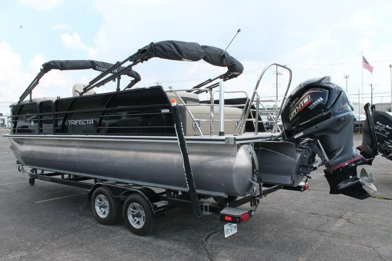 Slide: The Image of 2023 Trifecta 24UL-CS pontoon boat with Yamaha engine on trailer. - 5
