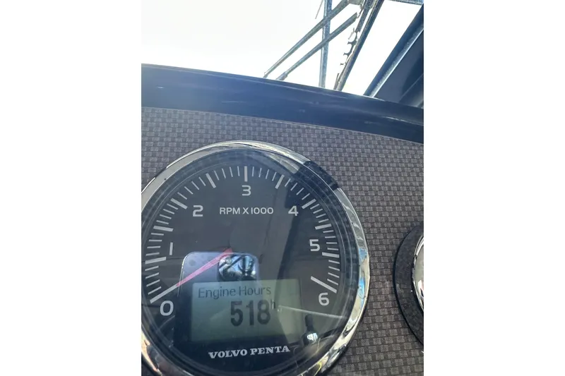 Slide: The Image of Close-up of 2014 Regal 35 Sport Coupe tachometer showing 518 engine hours. - 14
