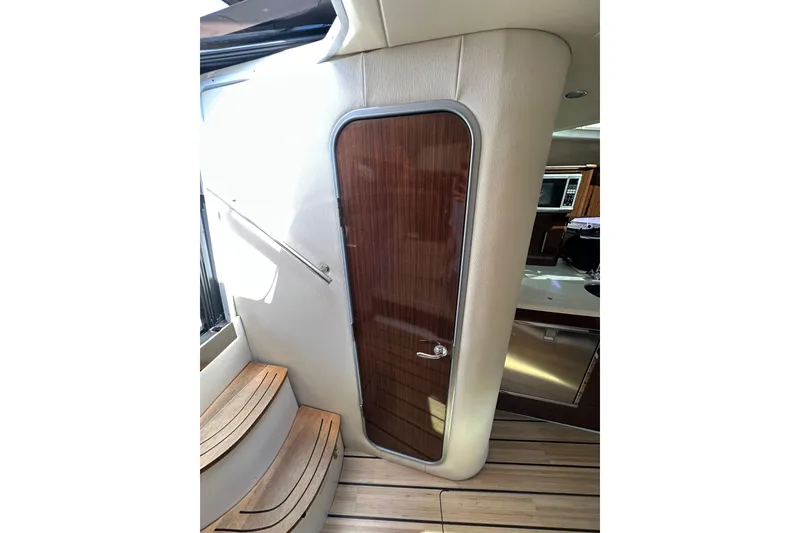 Slide: The Image of Interior of 2014 Regal 35 Sport Coupe with wooden door and steps. - 22