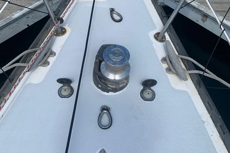 Slide: The Image of Deck of 1972 Tartan 41 sailboat with winch and cleats. - 14