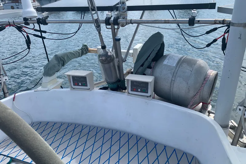Slide: The Image of Cockpit of 1972 Tartan 41 sailboat with equipment and propane tank. - 21