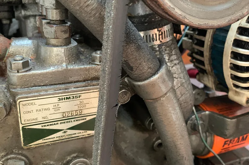 Slide: The Image of Yanmar diesel engine model 3HM35F, 30 HP, 3200 RPM, in a 1972 Tartan 41. - 64