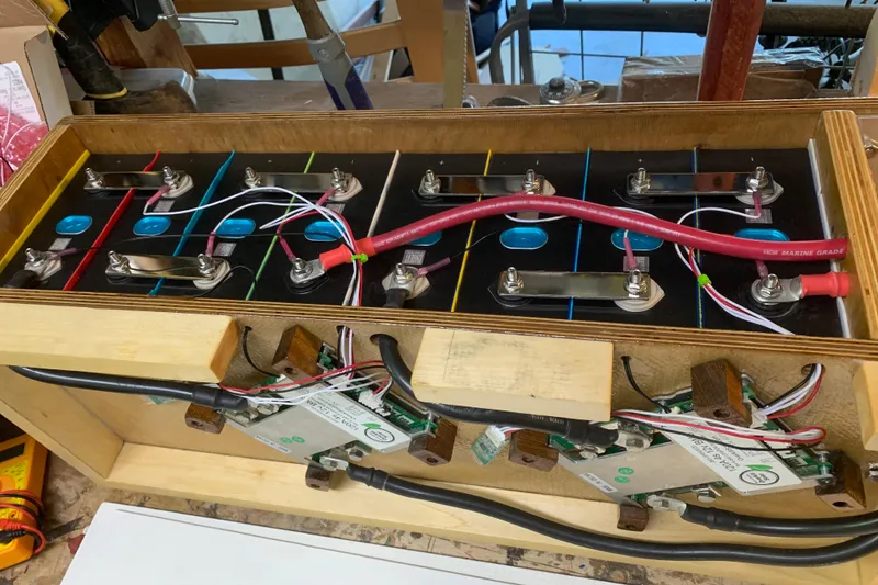 Slide: The Image of Battery setup inside a 1972 Tartan 41, featuring wiring and connectors. - 69