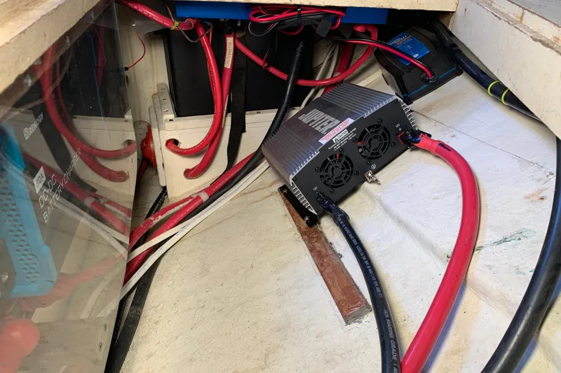 Slide: The Image of Electrical setup in a 1972 Tartan 41 sailboat with battery charger and wiring. - 71