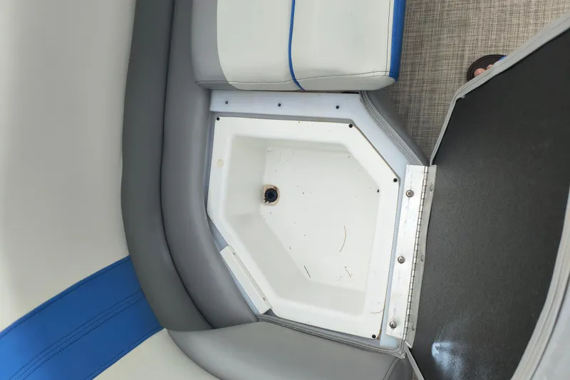 Slide: The Image of Interior view of 2025 SunCatcher Select 324RC boat seating and storage area. - 10
