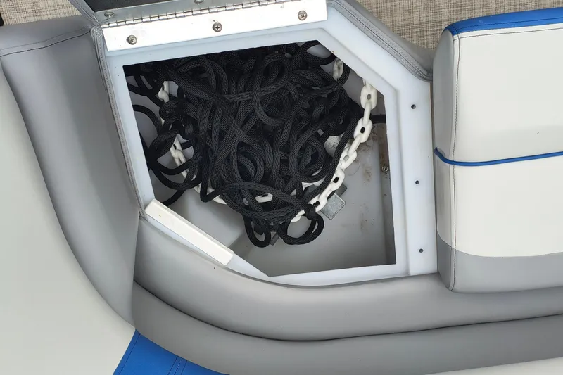 Slide: The Image of Storage compartment with ropes and chain on 2025 SunCatcher Select 324RC boat. - 15
