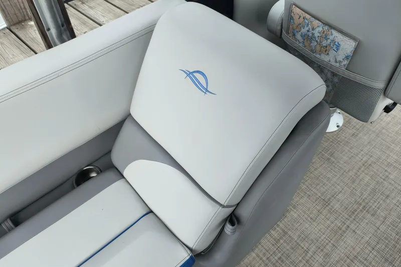 Slide: The Image of Luxurious seating on 2025 SunCatcher Select 324RC boat with elegant design and logo. - 30