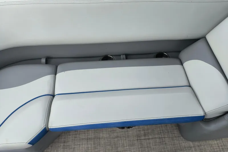 Slide: The Image of 2025 SunCatcher Select 324RC boat seating with gray and white upholstery. - 32