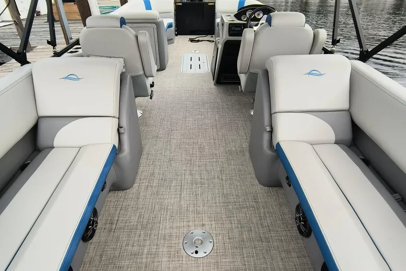 Slide: The Image of 2025 SunCatcher Select 324RC pontoon boat interior with plush seating and modern design. - 36
