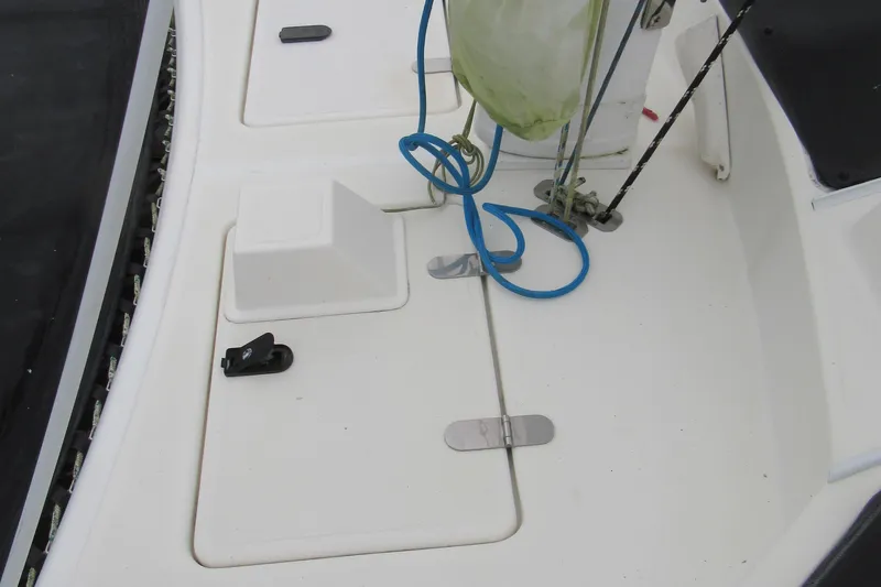 Slide: The Image of Deck of 2001 Catana 471 sailboat with ropes and fittings. - 22