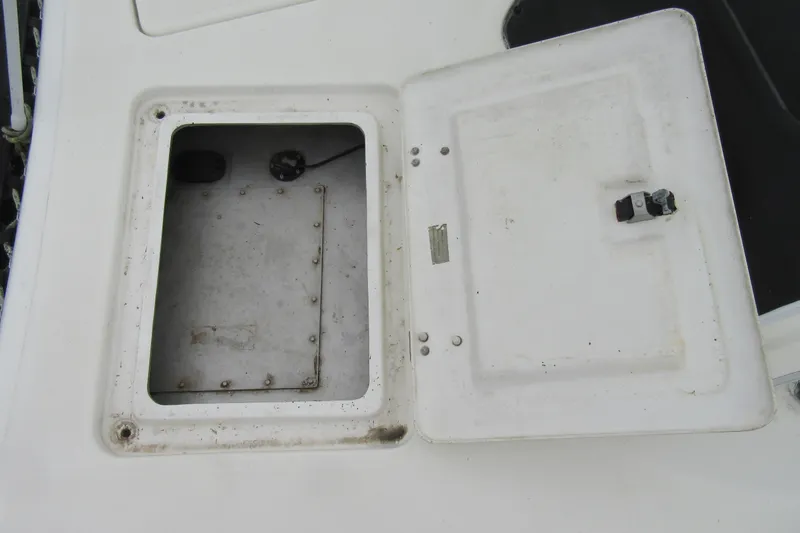 Slide: The Image of Open hatch on 2001 Catana 471 catamaran deck, showing interior compartment. - 27