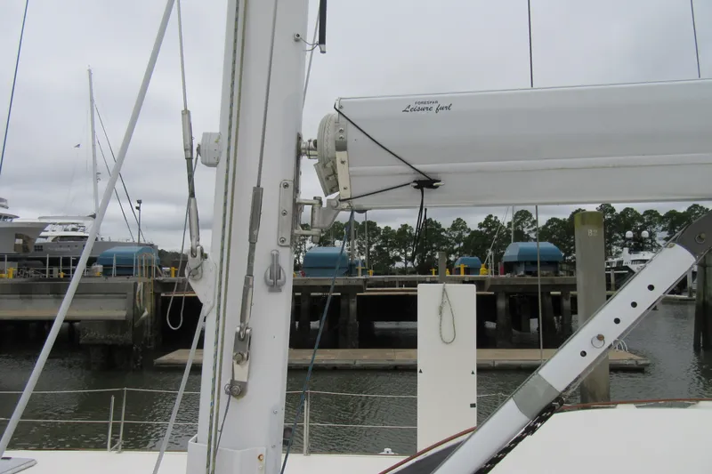 Slide: The Image of Catana 471 sailboat mast and rigging at a marina, 2001 model. - 38