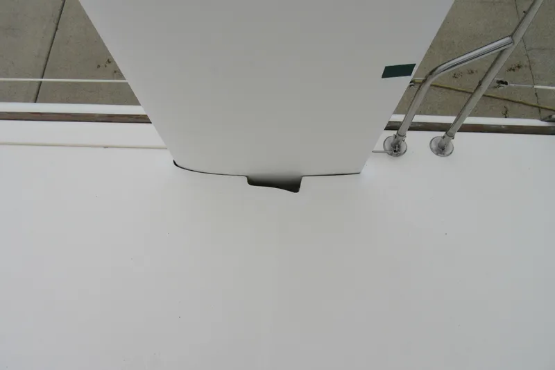 Slide: The Image of Catana 471 sailboat deck detail, 2001 model, featuring mast and railing. - 49