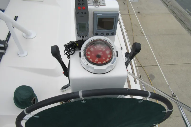 Slide: The Image of Catana 471 yacht helm with compass and navigation equipment, 2001 model. - 58