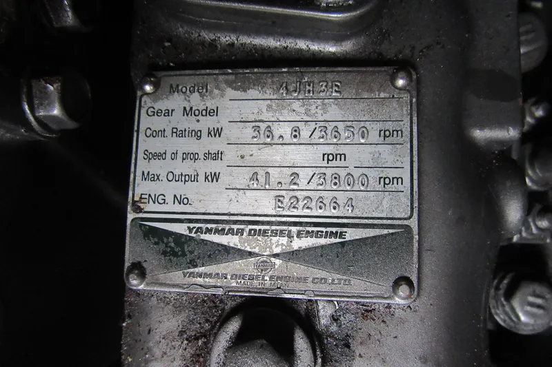 Slide: The Image of Yanmar diesel engine plate on 2001 Catana 471, showing specifications and model details. - 71