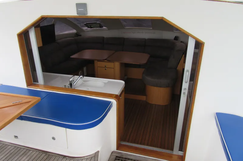 Slide: The Image of Interior of 2001 Catana 471 yacht with cozy seating and modern amenities. - 89