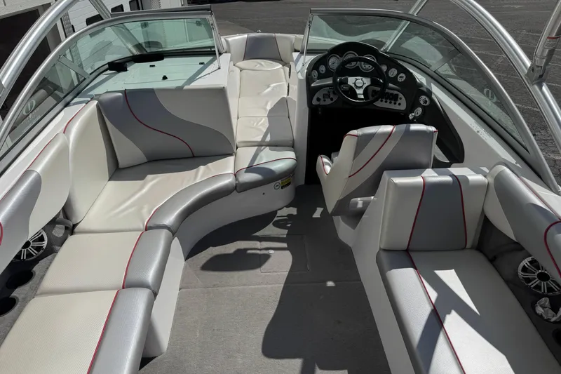 Slide: The Image of 2006 Moomba Mobius XLV boat interior with sleek seating and modern dashboard design. - 9