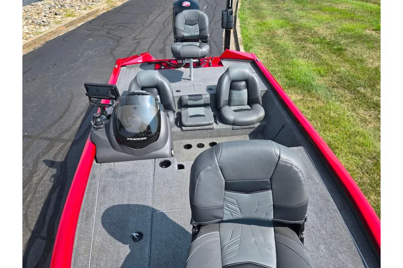Slide: The Image of 2020 Tracker Pro Team 195 TXW Tournament Edition boat interior with gray seating and red accents. - 22