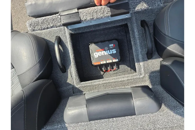 Slide: The Image of 2020 Tracker Pro Team 195 TXW Tournament Edition boat interior with NOCO Genius battery charger. - 24