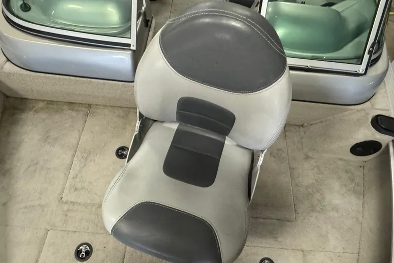 Slide: The Image of 2011 G3 Angler V172 FS boat interior with gray seat and carpeted floor. - 13