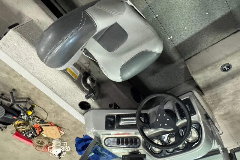 Slide: The Image of 2011 G3 Angler V172 FS boat interior with steering wheel and seat. - 6