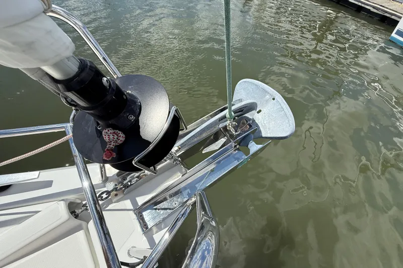 Slide: The Image of Anchor and bow of 2013 Beneteau Oceanis 41 sailboat on calm water. - 20