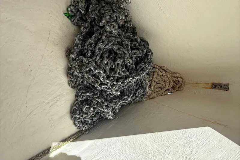 Slide: The Image of Anchor chain and rope in a 2013 Beneteau Oceanis 41 sailboat locker. - 21