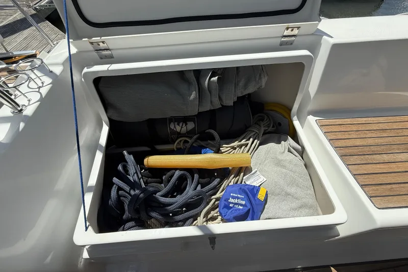 Slide: The Image of Storage compartment on a 2013 Beneteau Oceanis 41 sailboat with ropes and gear. - 35