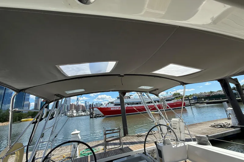 Slide: The Image of Beneteau Oceanis 41 sailboat cockpit view, docked in a marina, 2013 model. - 39