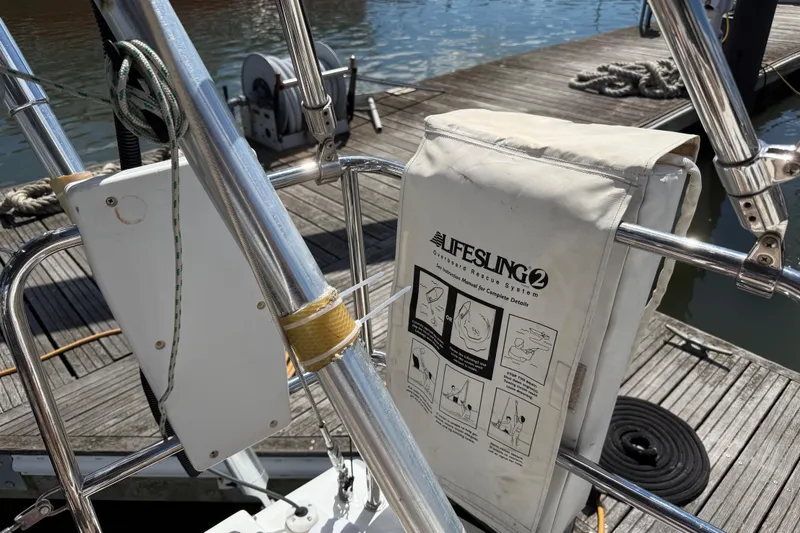 Slide: The Image of Lifesling 2 rescue system on 2013 Beneteau Oceanis 41 sailboat, docked at marina. - 43