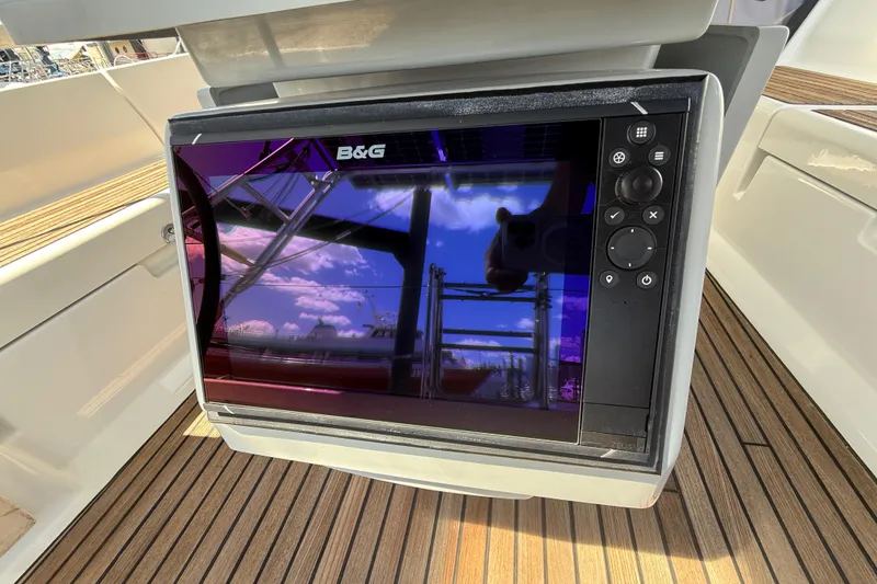 Slide: The Image of B&G navigation display on 2013 Beneteau Oceanis 41 yacht with wooden deck. - 47