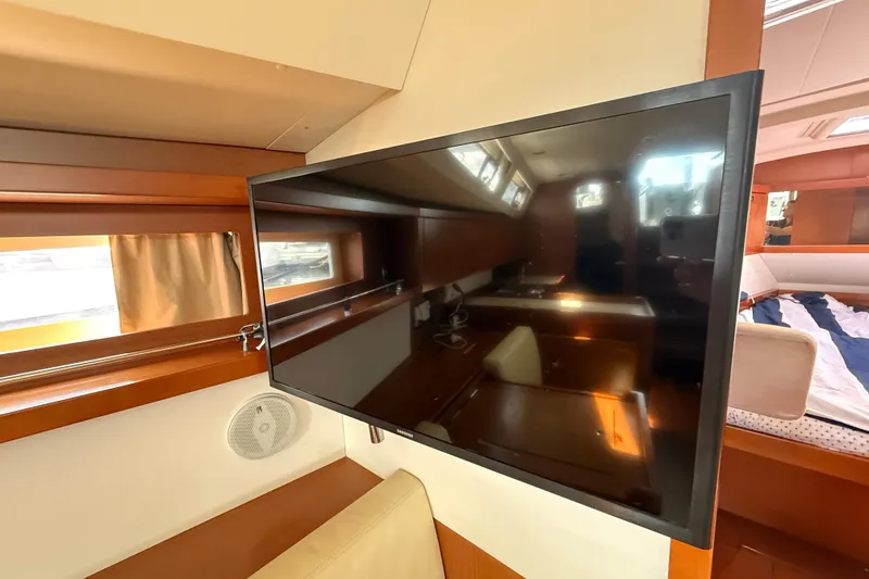 Slide: The Image of Interior of 2013 Beneteau Oceanis 41 yacht with mounted flat-screen TV. - 69