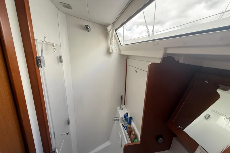 Slide: The Image of Interior of 2013 Beneteau Oceanis 41 yacht bathroom with shower and mirror. - 92