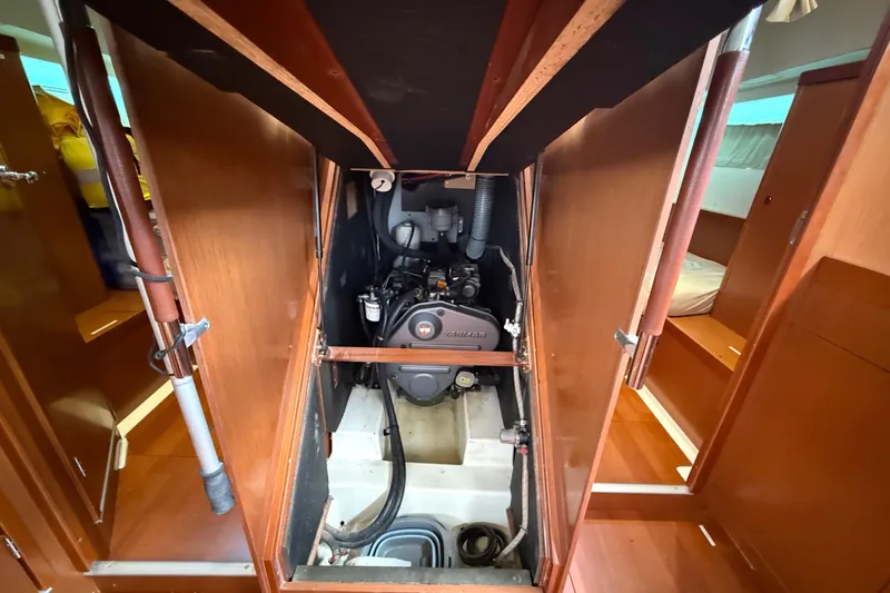 Slide: The Image of Engine compartment of 2013 Beneteau Oceanis 41 sailboat, showcasing Yanmar engine. - 97